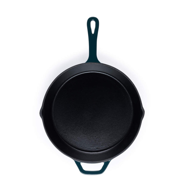 Cast iron frying pan with dark green handles, shown from above
