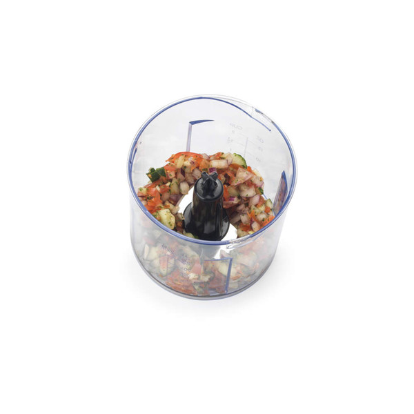Food processor bowl with chopped vegetables inside, shown from above