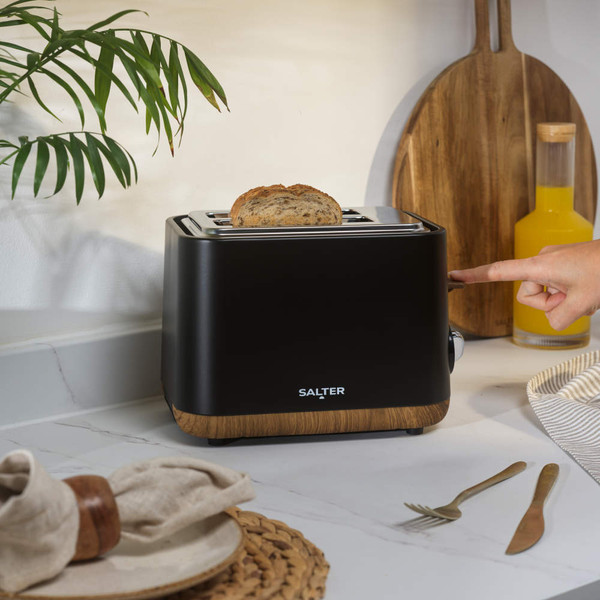 Black 2-slice toaster with wood effect base, side view