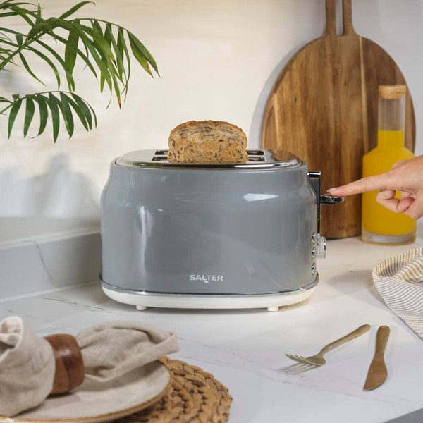 Grey toaster rear view showing removable crumb tray
