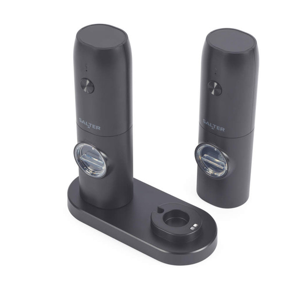 Black electronic salt and pepper grinder set with charging base, angled view