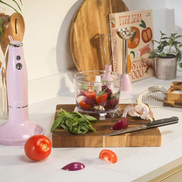 Pink hand blender set with chopper, whisk, and blending attachments