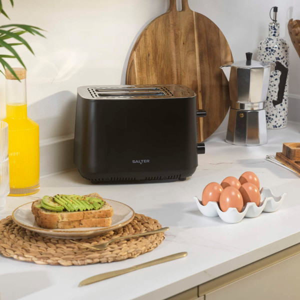 Black Salter toaster on kitchen counter with eggs and avocado toast