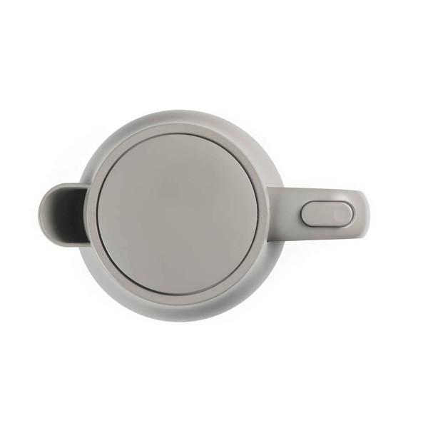 Taupe electric kettle pouring water into cup, shown in modern kitchen setting