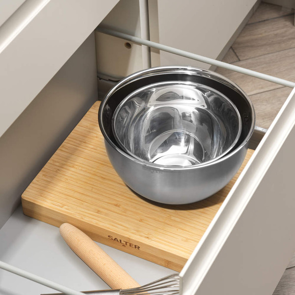 Set of two stainless steel mixing bowls in a kitchen drawer