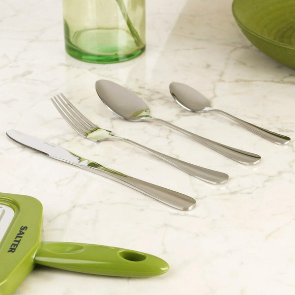 Four-piece stainless steel cutlery set on marble worktop