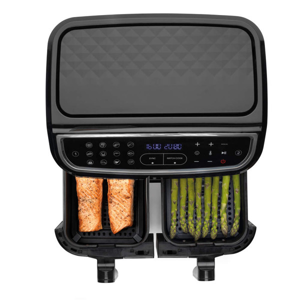 Black Salter dual air fryer in kitchen, both drawers cooking, with food served on plates nearby
