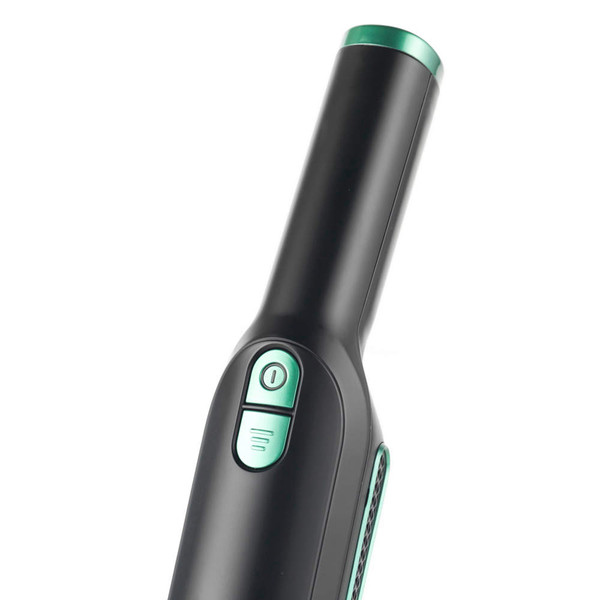 Black and green handheld cordless vacuum cleaner, close-up on controls