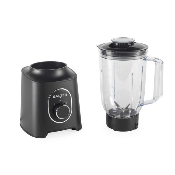 Black Salter blender base with dial, shown on kitchen counter with fruit and spinach.