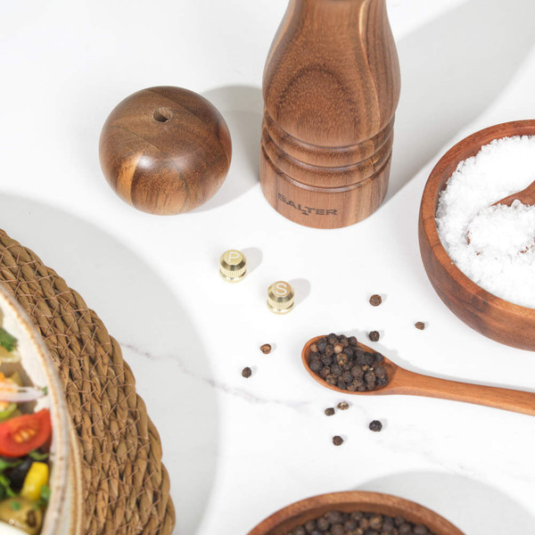Acacia wood manual pepper mill with Salter logo, angled view