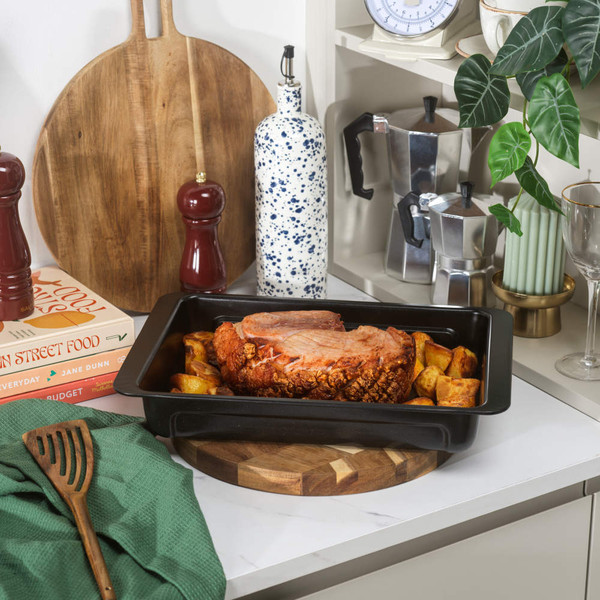Black rectangular roasting tin shown side view