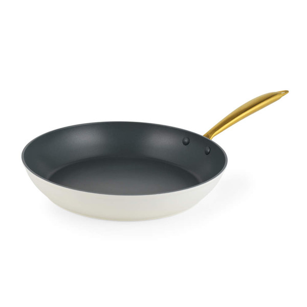 Cream non-stick frying pan with gold handle, shown from the side