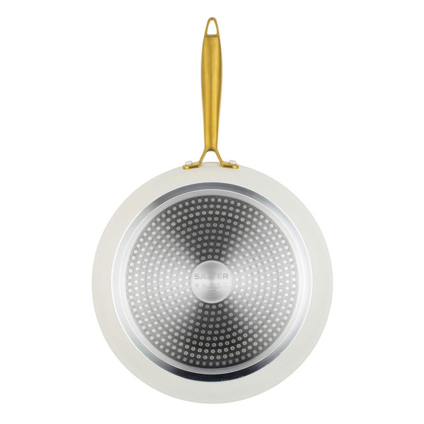 Cream frying pan with gold handle, base view, induction compatible