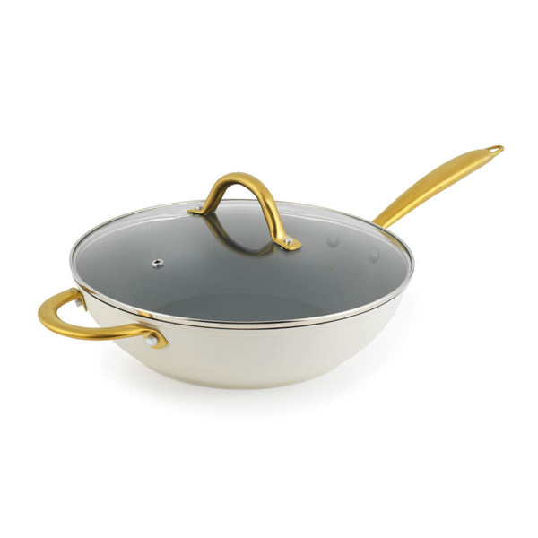 Cream wok with gold handles and glass lid, shown at angle for product listing