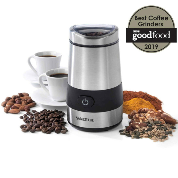 Salter electric coffee grinder with stainless steel finish, shown with coffee beans, nuts, spices, and two cups of coffee.