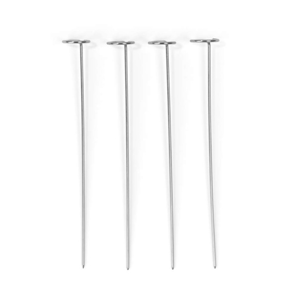 Set of four stainless steel skewers with flat loop handles on a white background