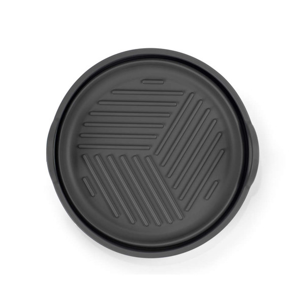 Round grey grill pan with raised ridges, top view
