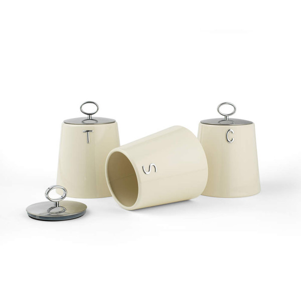 Set of three cream storage canisters with chrome lids labelled tea, coffee, sugar.