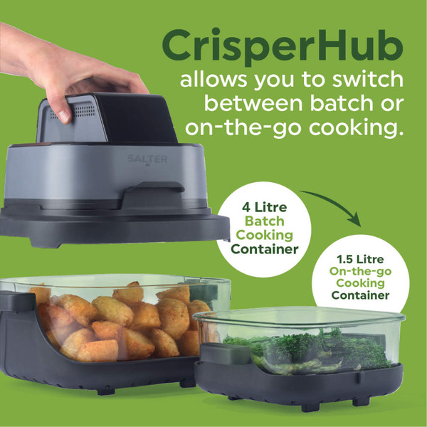 Salter air fryer cooking salmon, tomatoes and vegetables on a modern kitchen counter