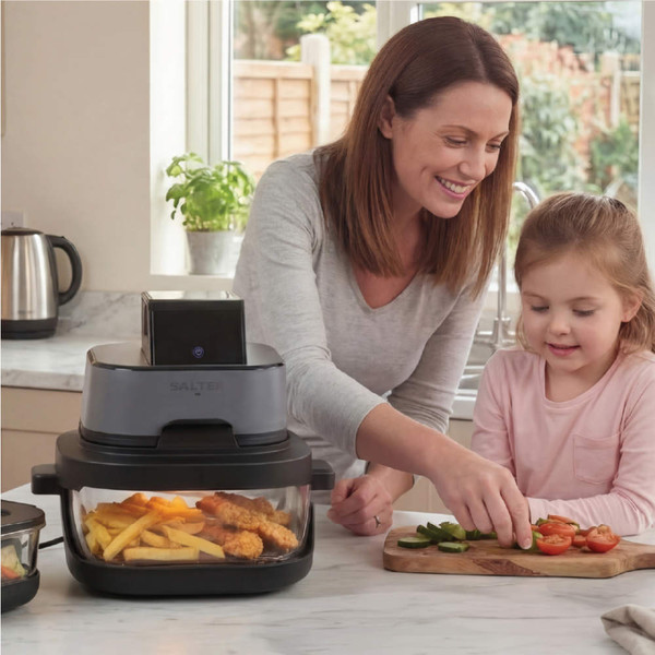 Banner showing Salter air fryer with roast chicken, highlighting PFAS-free, dishwasher safe containers.