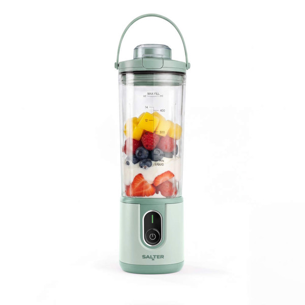 Green portable blender with fresh fruit and yogurt, front view.