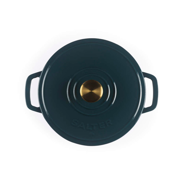 Green cast iron casserole dish with gold knob, top view