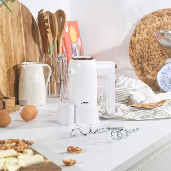 White Salter hand mixer with stand, beaters and dough hooks on kitchen counter