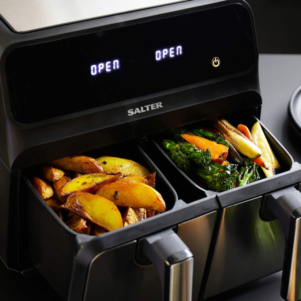 Salter dual basket air fryer with cooked potato wedges and vegetables