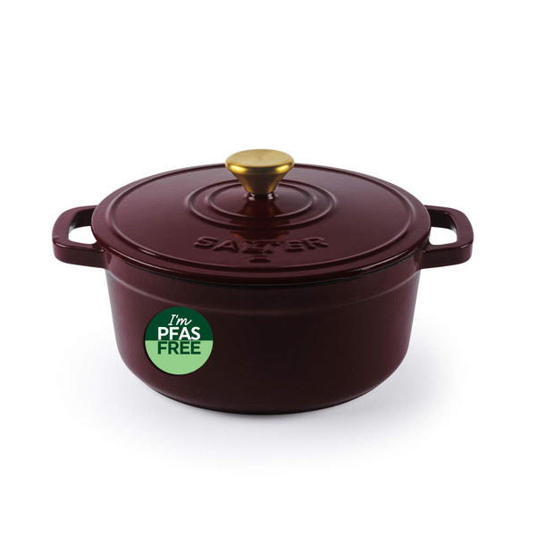 Red cast iron casserole dish with gold knob, PFAS free badge on side, product photo