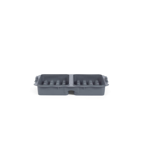 Grey silicone double burger press with ridged base, shown empty.