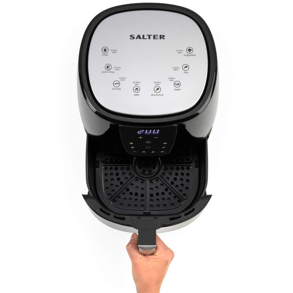 Black digital air fryer with touchscreen controls, basket filled with cooked chips