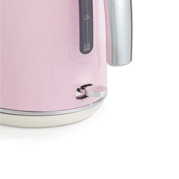 Pink electric kettle with water level indicator and chrome handle, side view