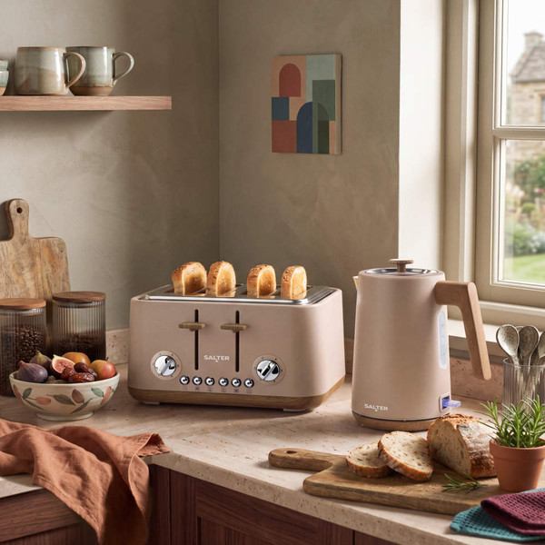 Blush pink 4-slice toaster and kettle set on a kitchen worktop