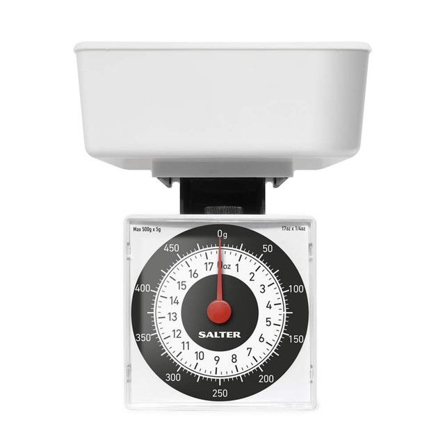 White mechanical kitchen scale with bowl, showing Salter brand and 500g capacity.