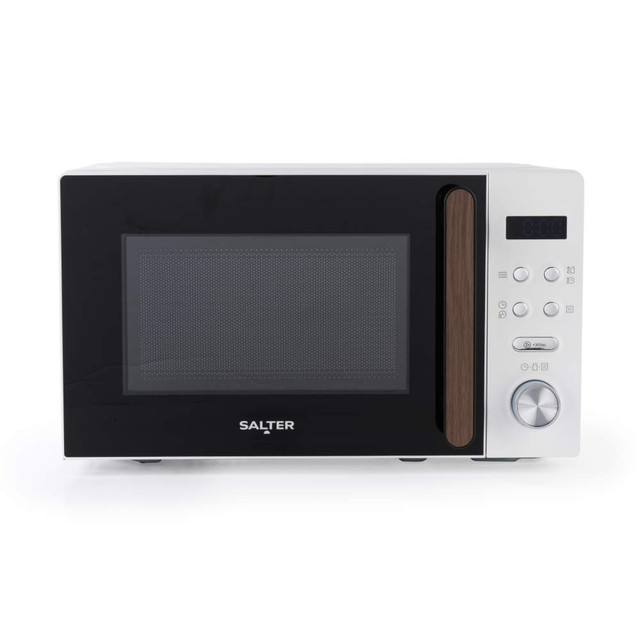 White microwave oven with black door, wood-effect handle, and silver control panel