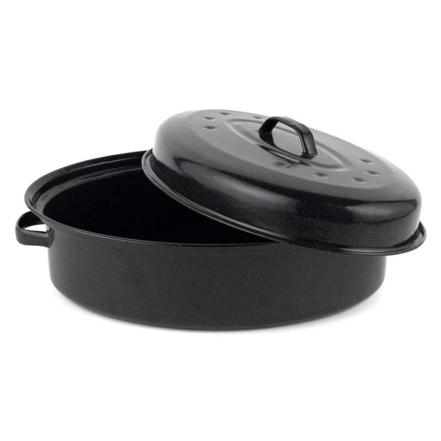 Black oval roasting pan with handles and domed lid, shown open.