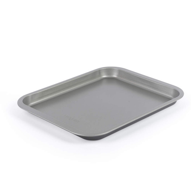 Grey non-stick rectangular baking tray, angled view