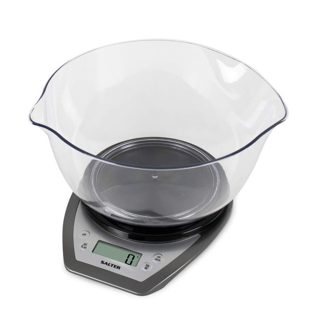 Digital kitchen scale with large clear mixing bowl, silver base, display shows zero