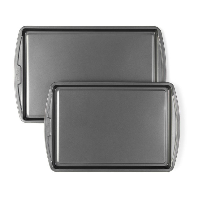 Set of two non-stick grey baking trays with wide grip handles, shown on white background
