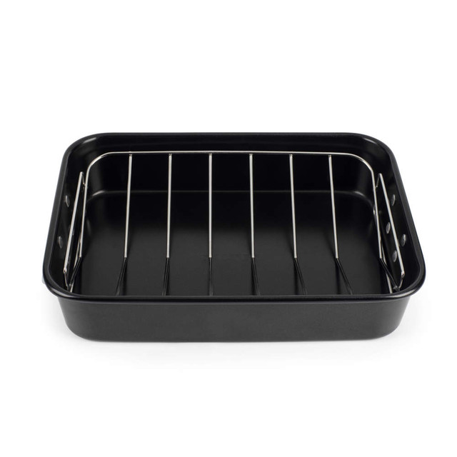 Black non-stick roasting tin with silver metal rack, shown empty, for oven cooking.