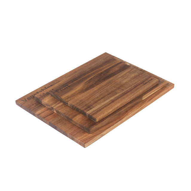 Set of three wooden chopping boards for meat, fruit, and vegetables