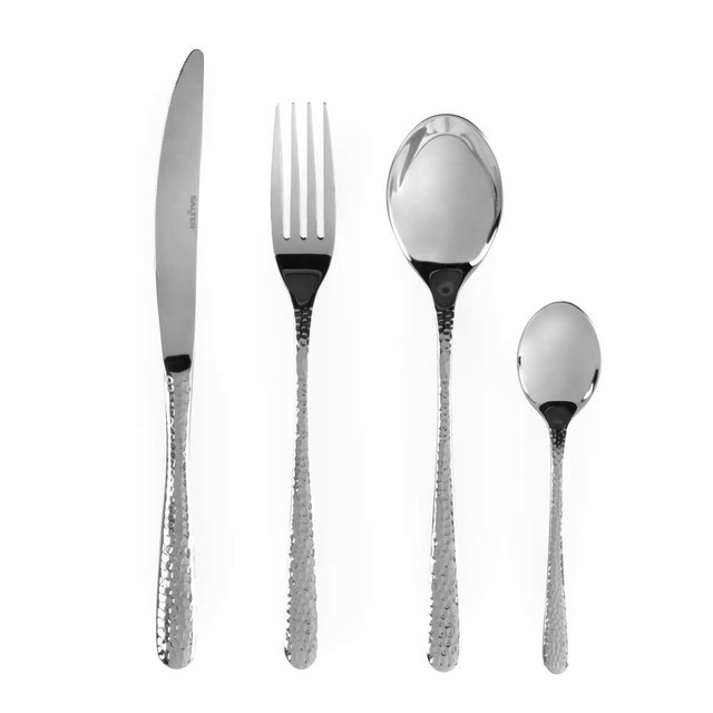 Four-piece silver cutlery set with hammered handles: knife, fork, dessert spoon, teaspoon.