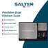 Digital kitchen scale with two platforms, bowl of brown sugar, chocolate pieces, and clear display