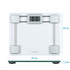 Silver digital bathroom scale with glass platform on tiled floor