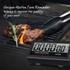Digital meat timer by Heston Blumenthal next to steak on BBQ grill, grilling aid feature shown