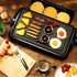 Electric grill with cooked chicken fillets, vegetables, and salmon canapés on tray