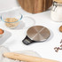 Salter digital kitchen scale with stainless steel platform on white worktop