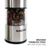 Brushed stainless steel electric salt or pepper mill with clear acrylic body, close-up