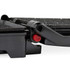 Close-up of black electric grill hinge and red button for adjustable height