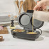 Black electric omelette maker on kitchen counter